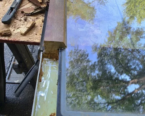 Refinished wooden window sash after repair in Highland Park IL