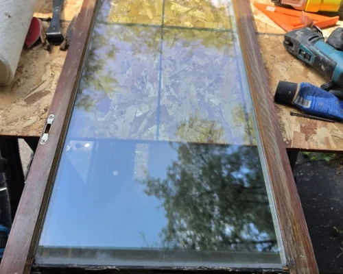 Rotten wood sash repair before and after in Highland Park Illinois